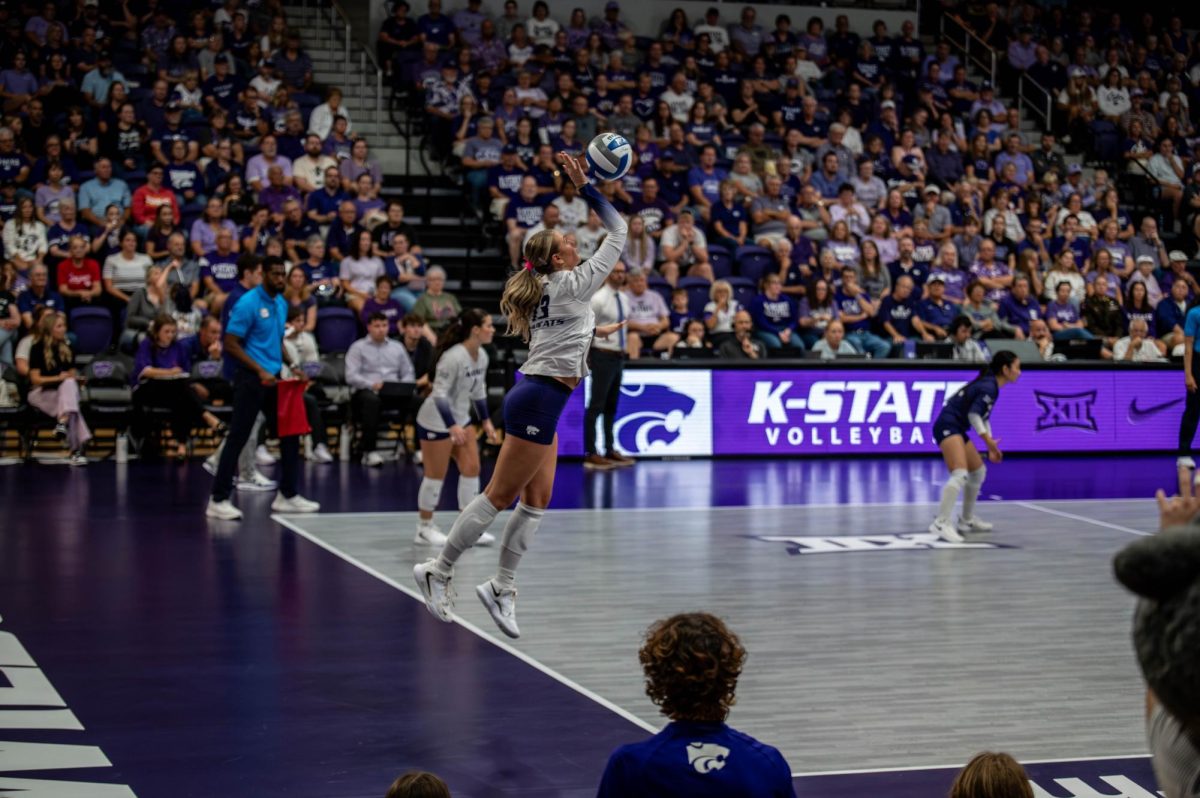 Lauren Latham serves the ball over the net against Houston on Sept. 27, at Morgan Family Arena. K-State recorded three service aces during the match, with Lauren Latham, Fuka Sekita and Addison Massey each contributing one.