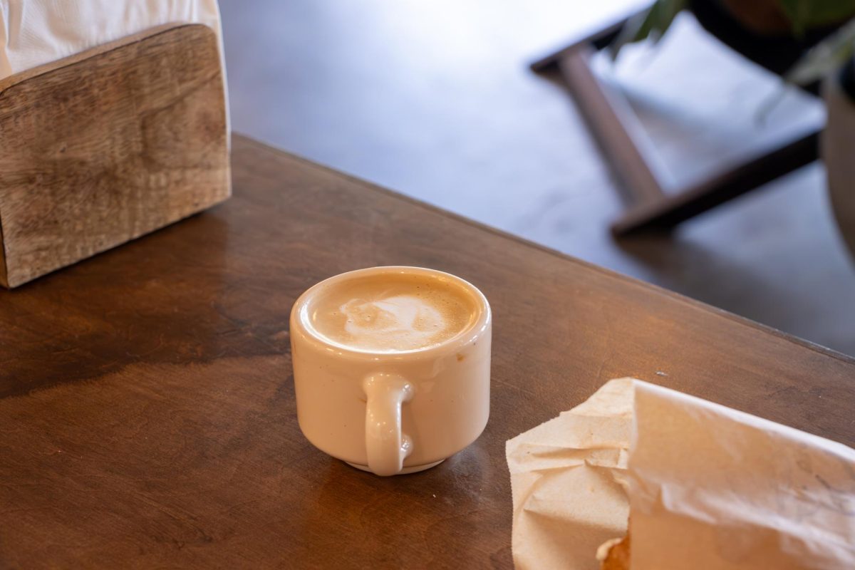 A customer's coffee and bagel sit on the counter at the newly opened Bandidas Coffee Co. on Sept. 15.