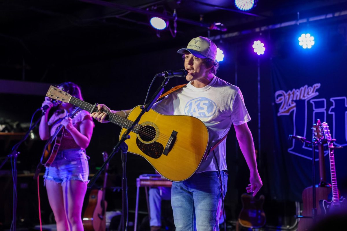 Country singer Waylon Wyatt performs at The Hat in Manhattan on Sept. 8. This was Wyatt’s first performance in Manhattan, drawing a sold-out crowd to the Aggieville venue. 