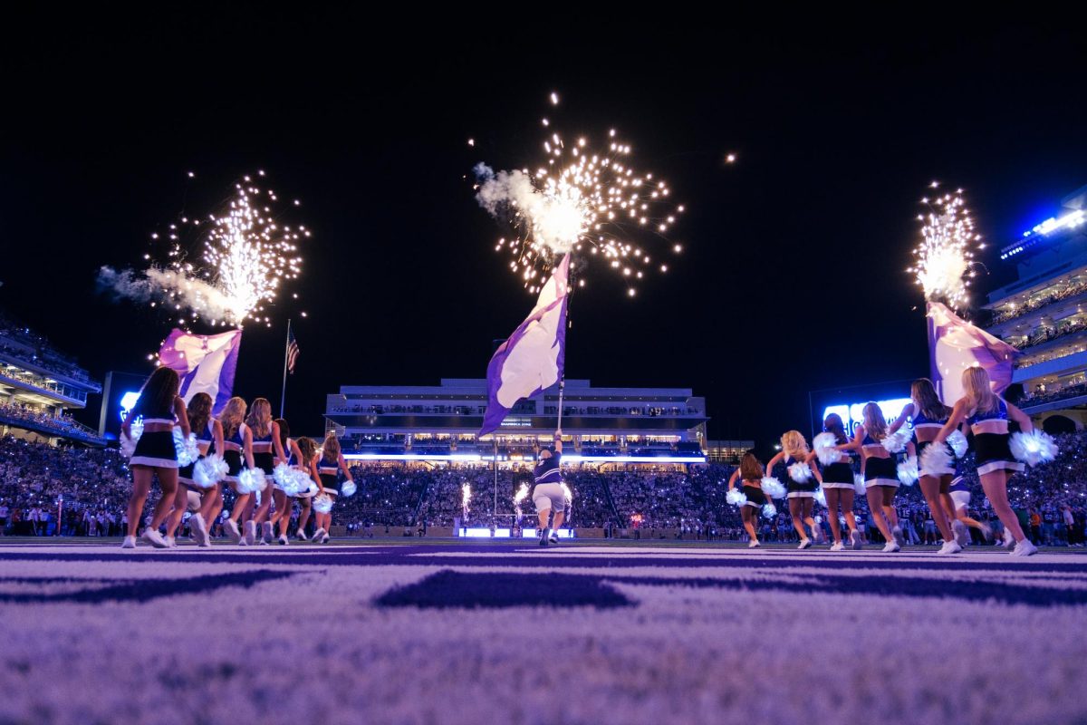 Fireworks and glowing poms light the field at Bill Snyder Family Stadium during the 4th quarter intermission on September 5. The Wildcats would score 71 points in a game debuting new coaches and stadium features.