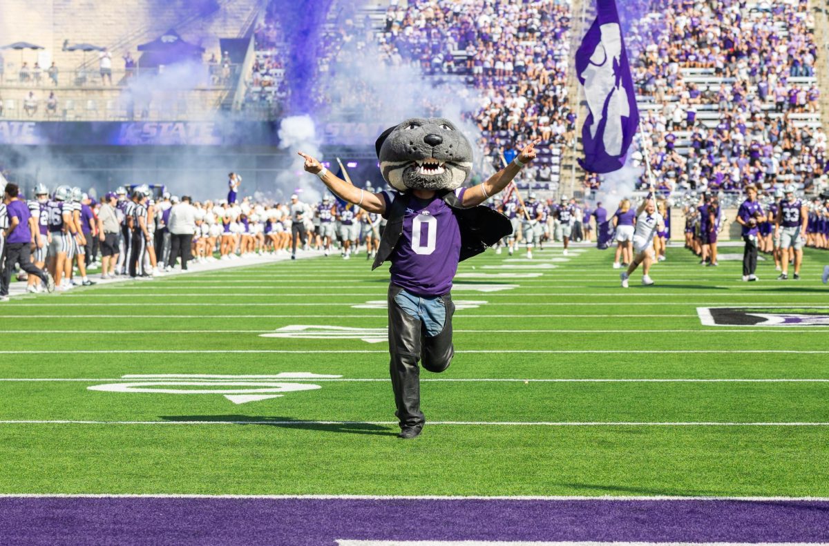 Willie runs onto the field with the team towards the crowd before facing Tulane. The Wildcats defeated Tulane 31-20 on Sept. 19 at Bill Snyder Family Stadium. 