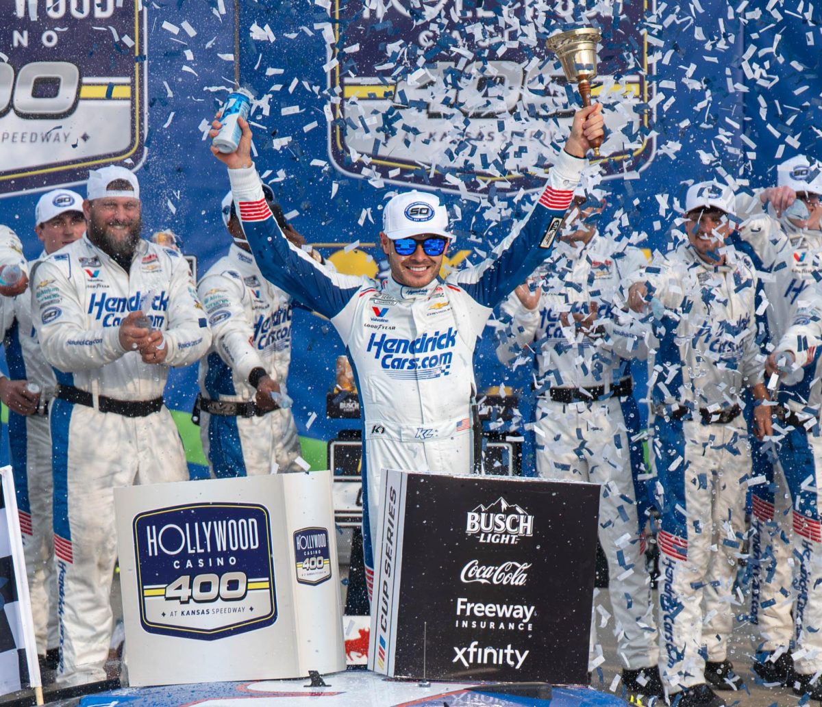 Kyle Larson celebrates in victory lane after winning the Hollywood Casino 400. This is his 4th cup win at Kansas.