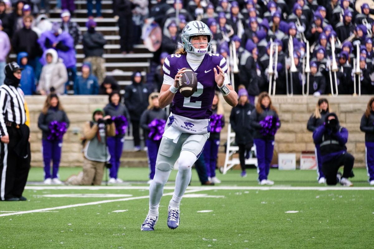 Quarterback Avery Johnson (2) steps back to throw from the shotgun against Colorado on November 29, 2025 at Bill Snyder Family Stadium. Johnson would finish with 151 yards of offense in the 24-14 victory over the Buffaloes. 