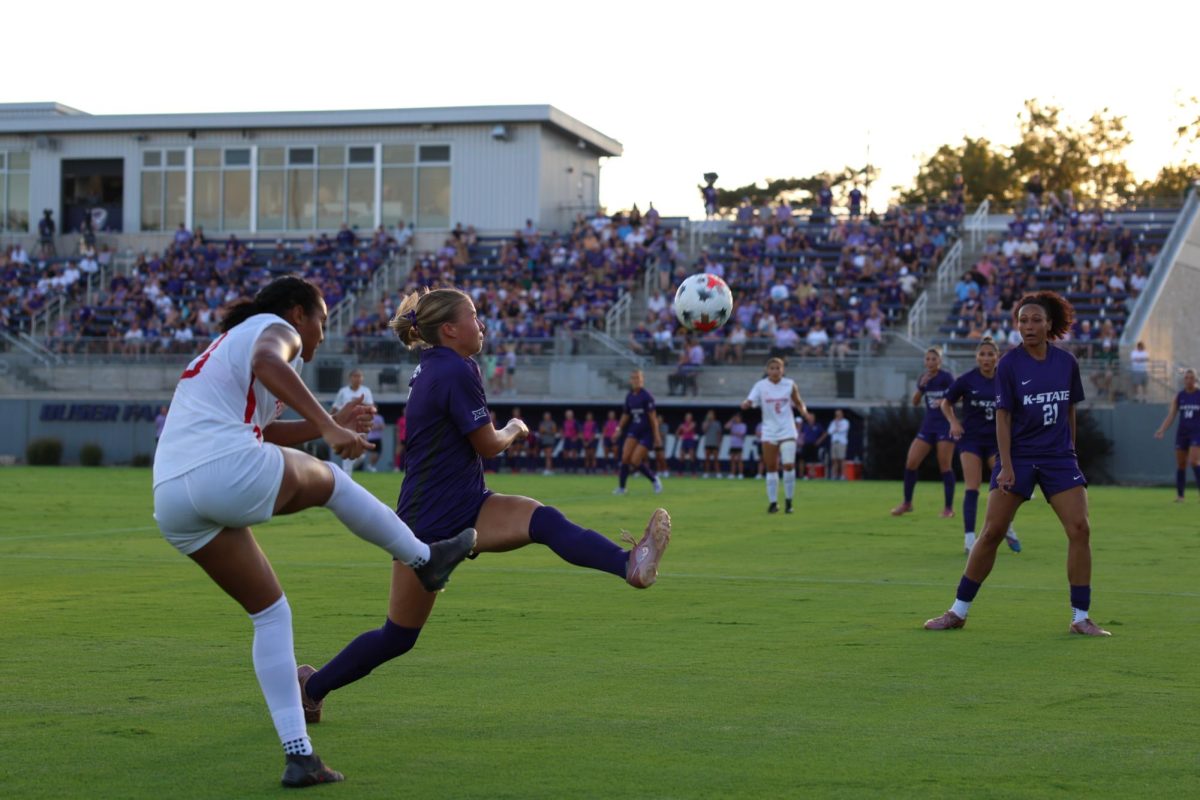 Rilyn Rintoul defends the ball from Houston on Sept. 18. The Wildcats suffered their first loss of the season to Houston, 3-0.  