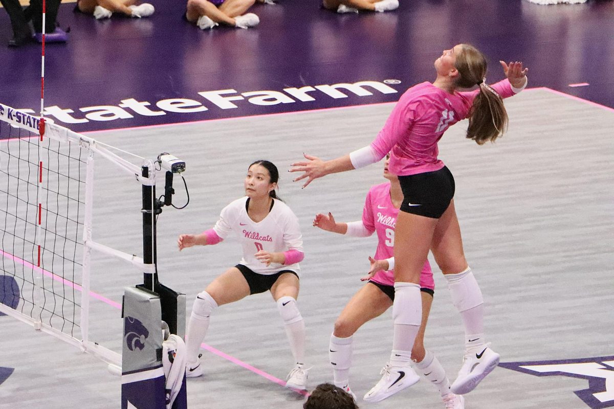 K-State's Skylar Brady (11) attacks against Utah at Morgan Family Arena on Oct. 3. Brady recorded 3 kills in the match as the Wildcats fell to the Utes, 3-0. 