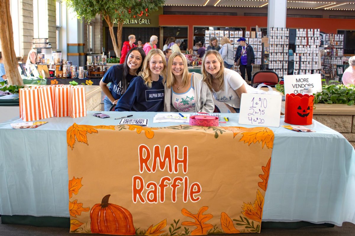 Alpha Delta Pi members pose for a photo at their 52nd annual arts and crafts fair, supporting the Ronald McDonald house and the Alpha Delta Pi Foundation.