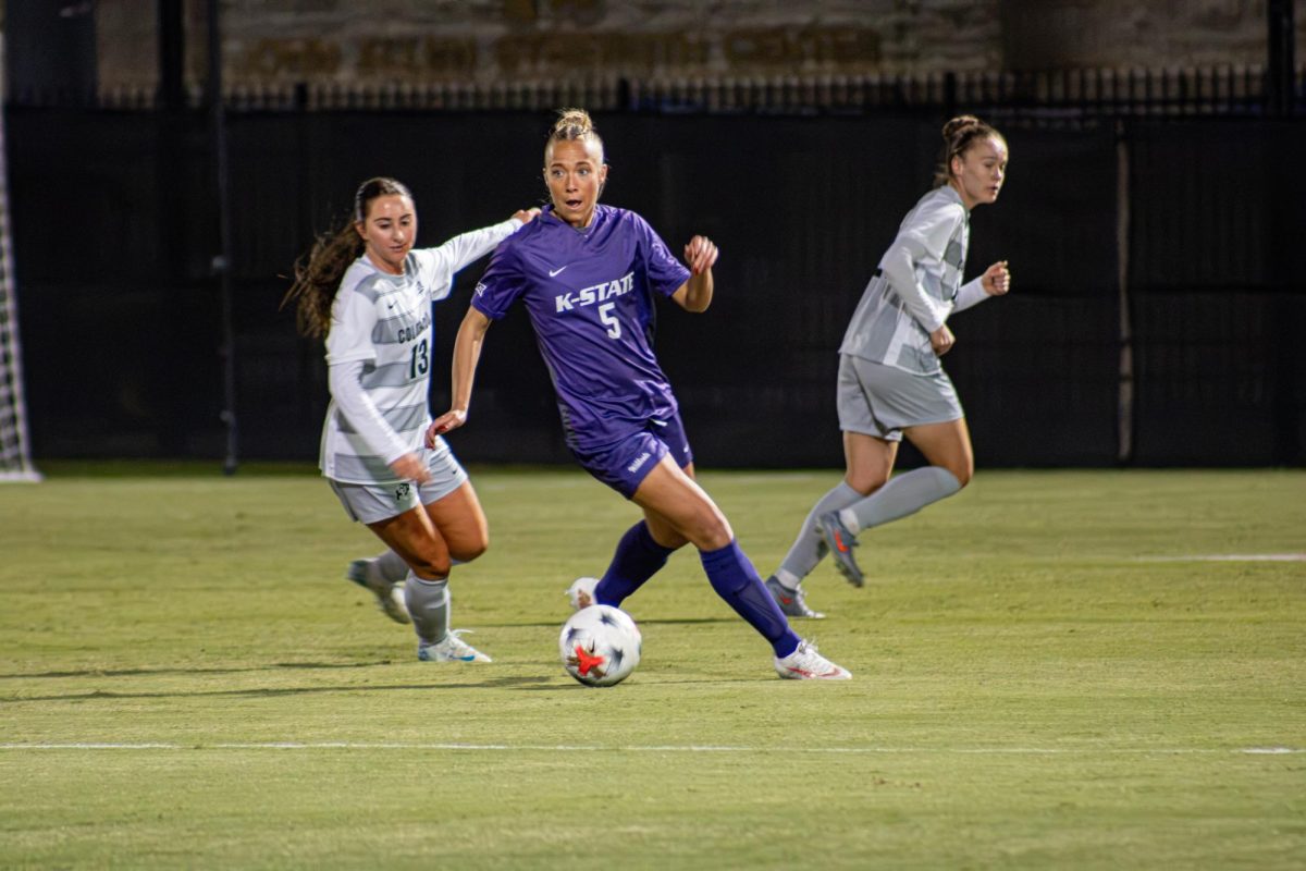 Sophie Simmons prepares to pass to a teammate during K-State’s match against Colorado at Buser Family Park on Oct. 16. The senior defender has appeared in seven matches this season.