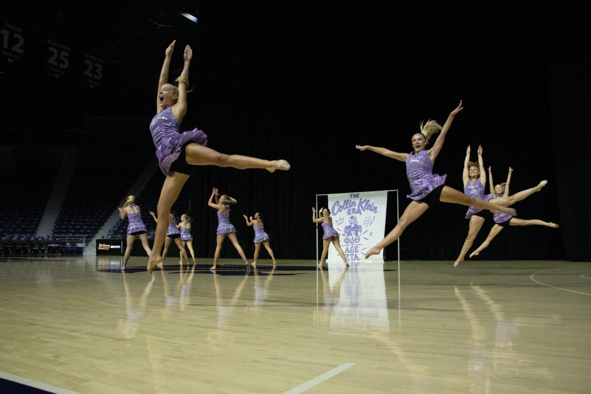 Zeta Tau Alpha members dance and leap into the air at Wildcat Request Live on Oct. 13 in Bramlage Coliseum.
