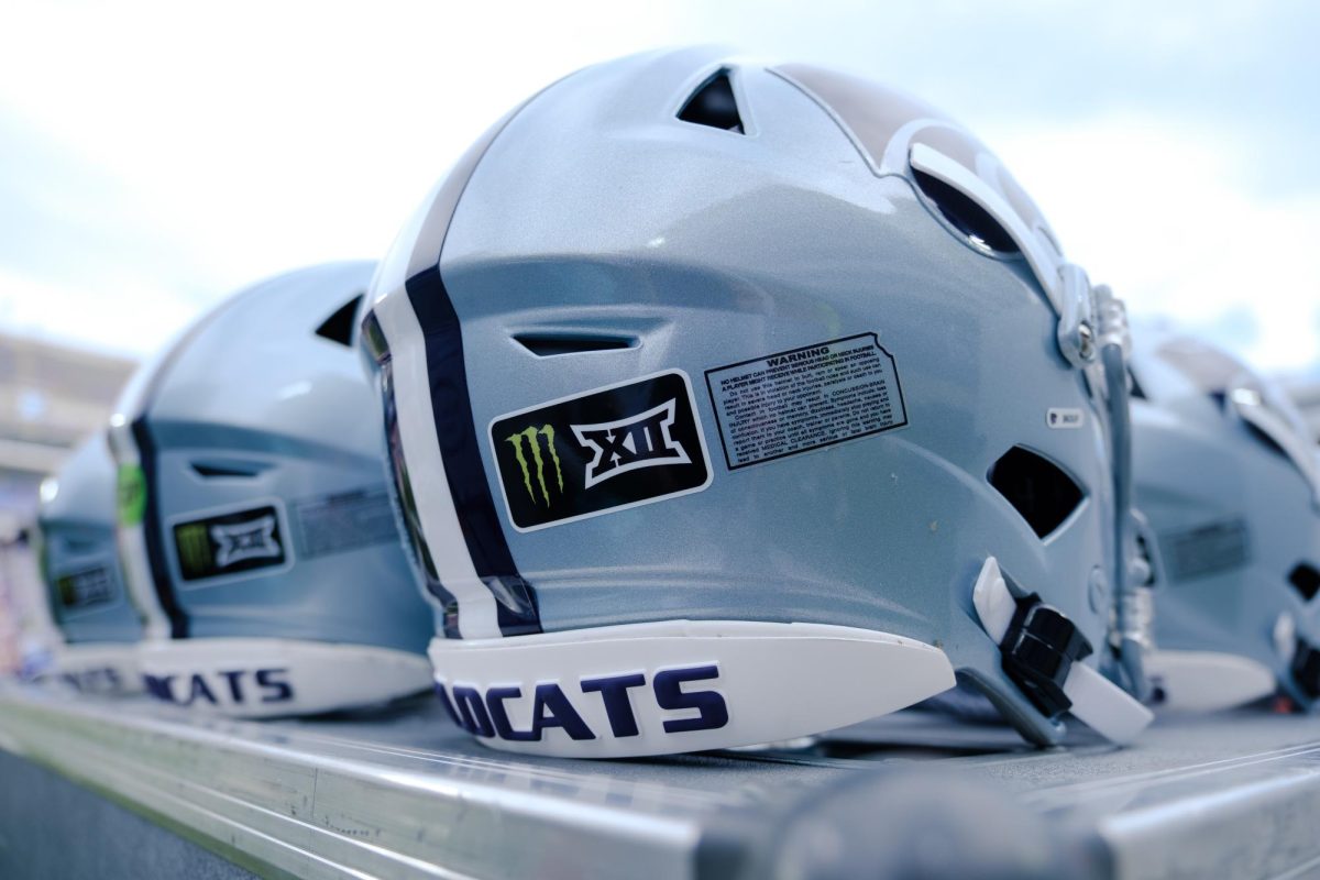 K-State Football helmets feature the Monster x Big 12 sticker at the Sept. 5 home opener against Nicholls. Media deals brought branding to uniforms and fields across the conference. 
