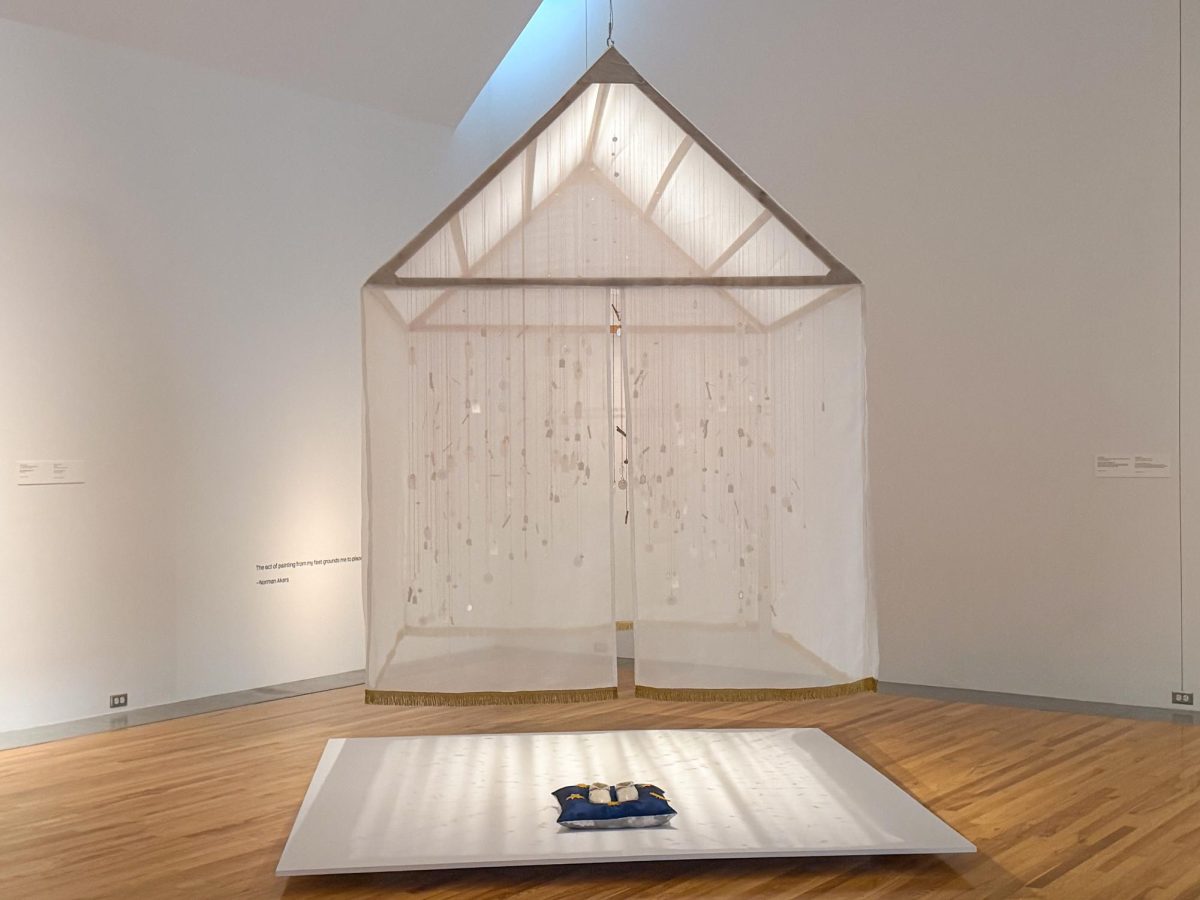 An installation hangs from the ceiling inside the Marianna Kistler Beach Museum of Art. The piece is part of Home/Land: Wahzhazhe Artists Speak, an exhibition highlighting the work of Osage artists.
