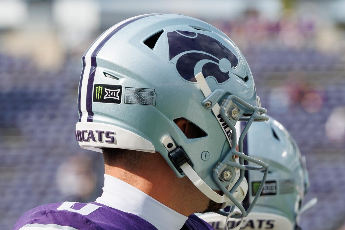 A close-up view of a K-State helmet featuring the Big 12 x Monster logo on the field during pregame warmups ahead of the Sept. 12 game against Washington State. 