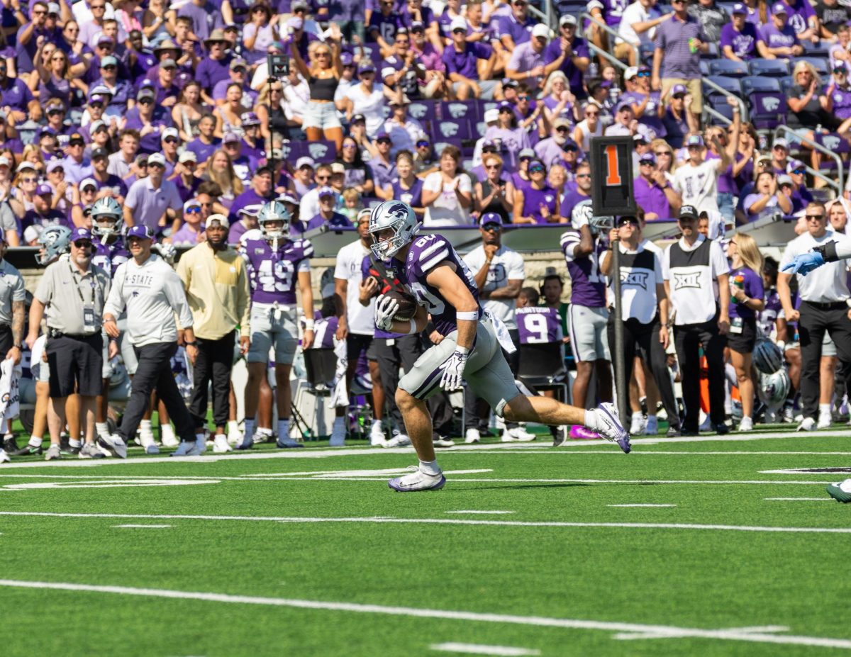 Will Anciaux runs downfield after receiving a pass from Avery Johnson. Anciaux had 3 receptions for 59 yards against Tulane. The Wildcats defeated the Green Wave 31-20 on Sept. 19 at Bill Snyder Family Stadium.
