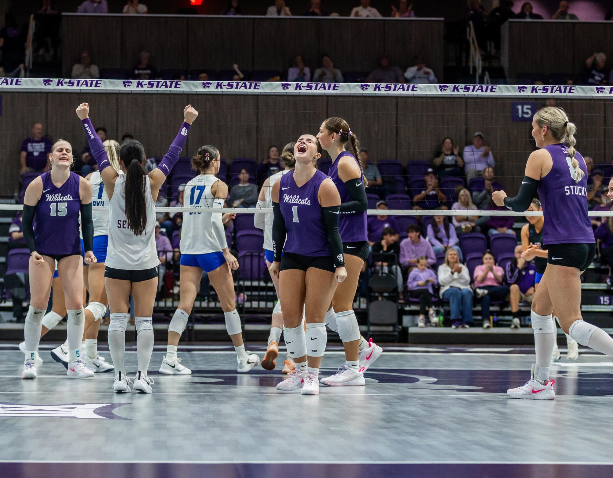 Caleigh Ponn celebrates a successful point against the Cougars. Ponn recorded one assist. The Wildcats fell to BYU 1-3 on Oct. 2.