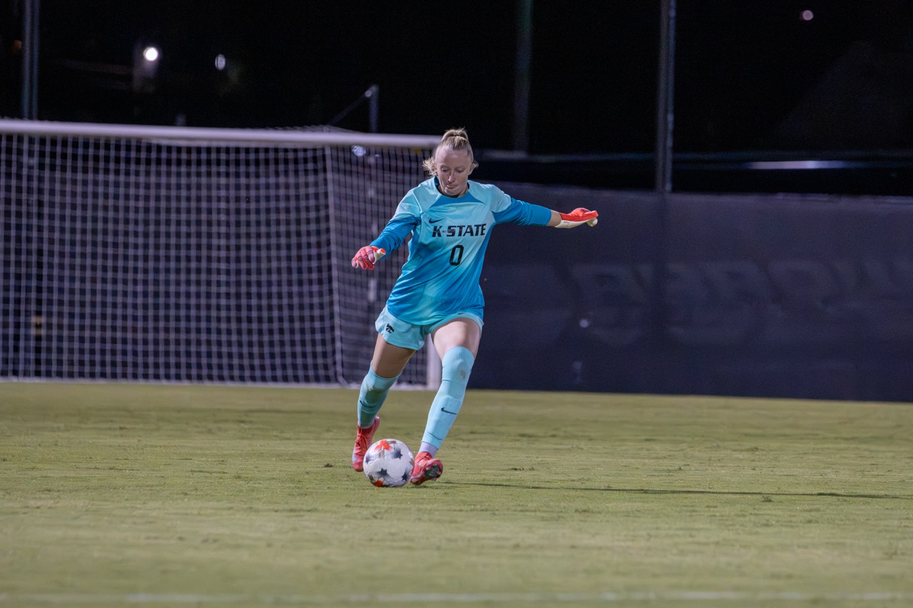 Junior goalkeeper Maddie Sibbing is kicking the ball back downfield away from her goal. The Wildcats fell 2-0 to the Jayhawks on October 8th, 2026, at Buser Family Park. 